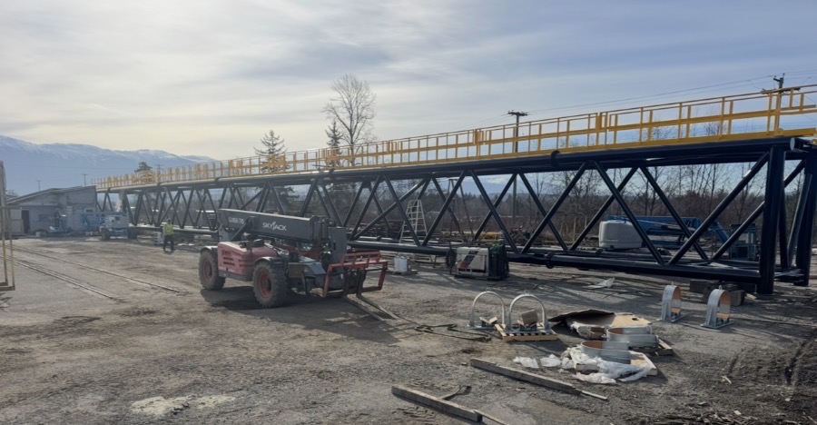 Coated steel truss on a job site