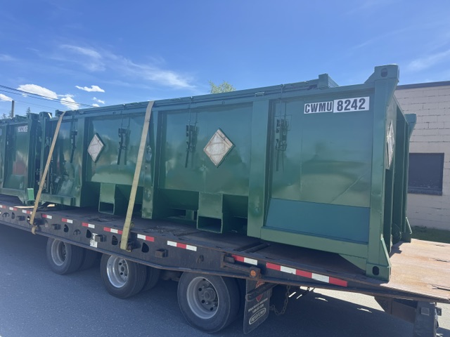 Freshly coated steel container loaded on a flatbed
