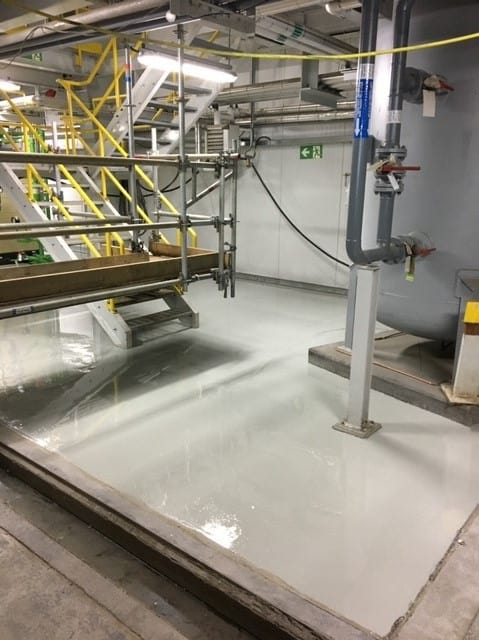 Concrete floor coating in a turbine building