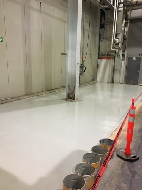 Finished concrete floor coating