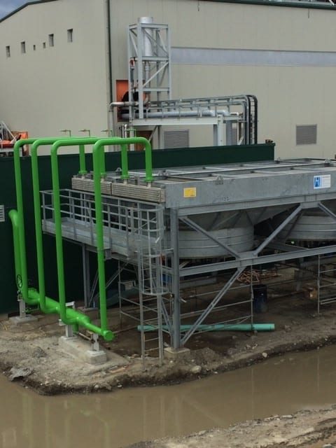 Coated green piping at a biomass facility